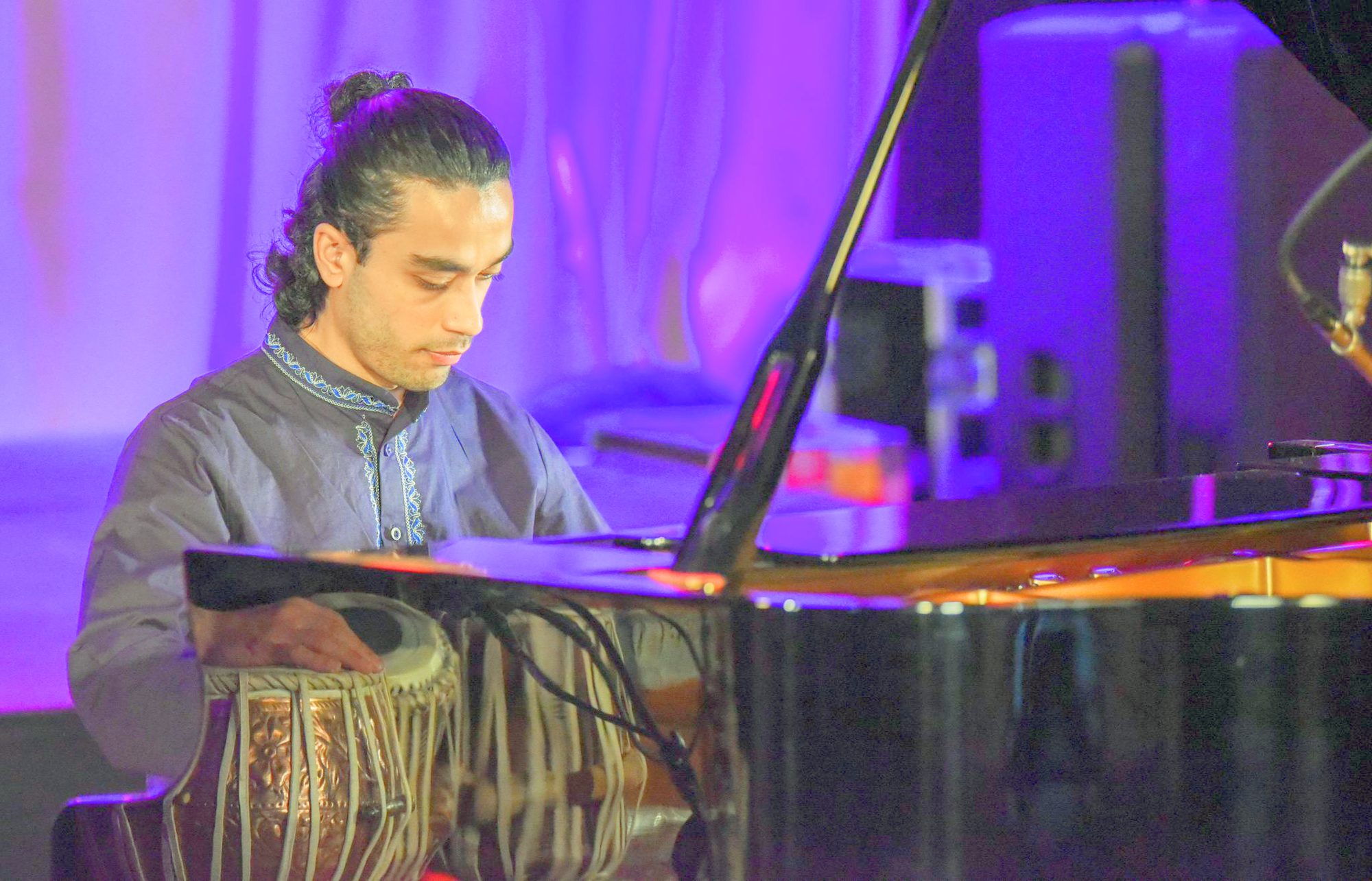 Elham Fanoos at the piano during an ensemble performance